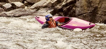 Swimming Kayaker